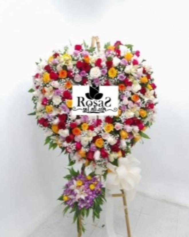 Corazón fúnebre de rosas en cali