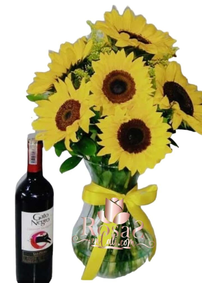 Jarrón de girasoles y vino en cali