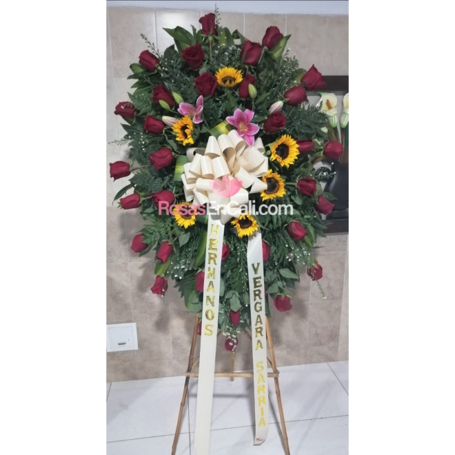 Corona fúnebre rosas y girasoles