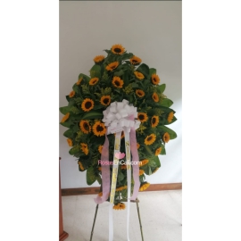 Corona fúnebre de girasoles en cali